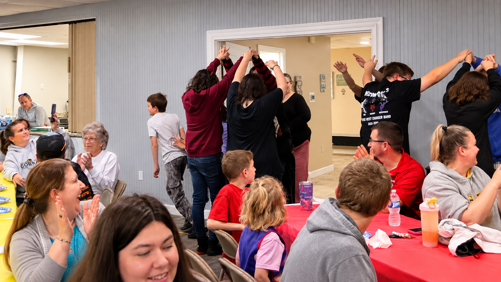Children and adults participating in an activity at Maranatha Baptist Fellowship